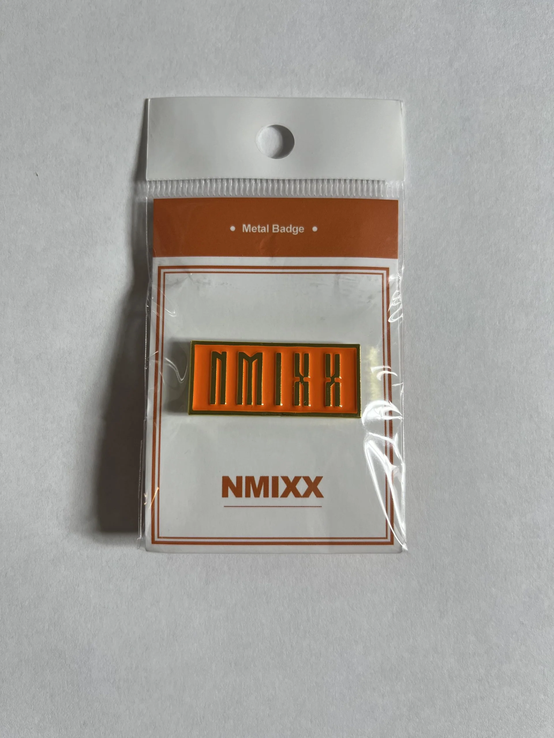 NMIXX Logo Pin Badge